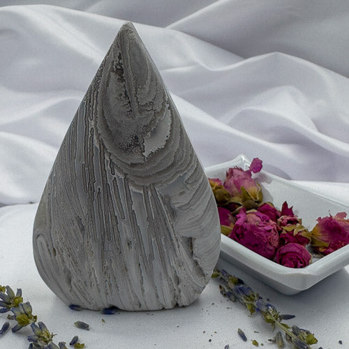 Davinas handcrafted agate for collection with natural gray and white patterns displayed with dried flowers