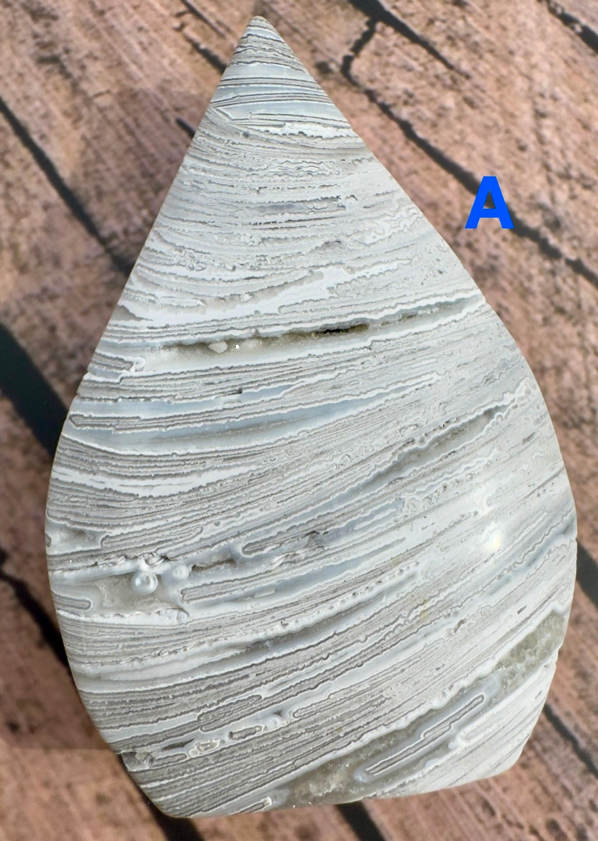Davinas Morocco agate freeform stone with smooth layered white and gray patterns