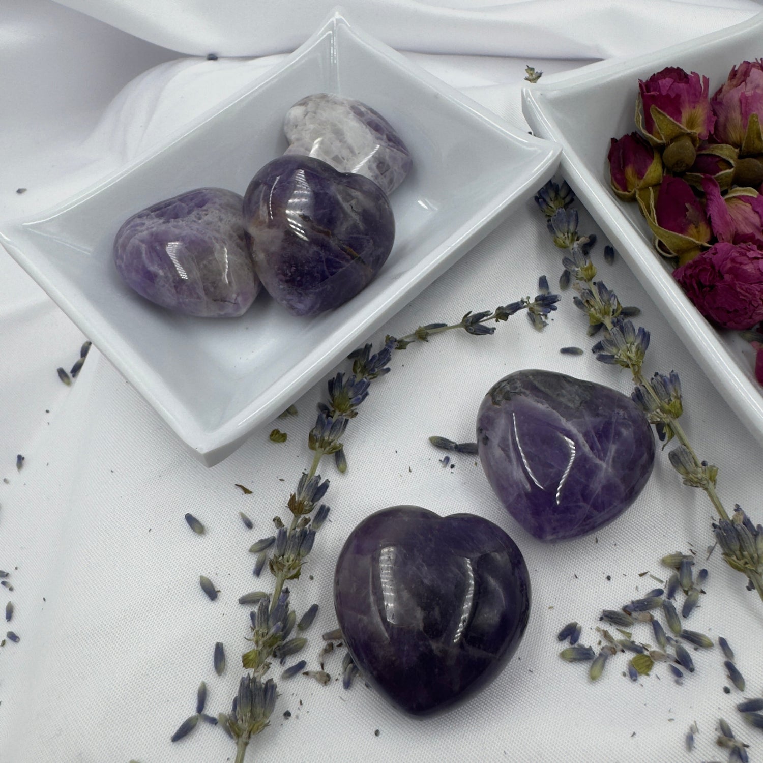 Buy chevron amethyst online polished heart and tumbled stones displayed with dried lavender and rose buds